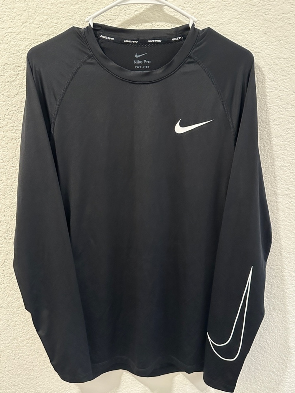 Nike Pro Black Long-Sleeve Dri-FIT Performance Shirt with White Swoosh on Sleeve